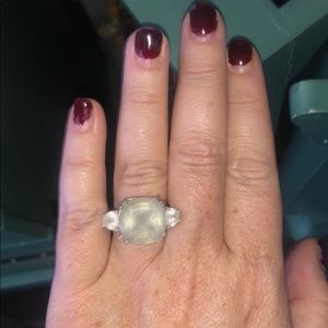 Light blue aquamarine with triangular white Topaz